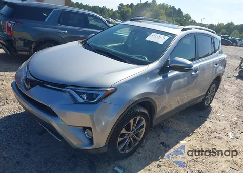 2018 Toyota Rav4 Limited z USA, uszkodzony, nr VIN JTMYFREVXJD112924